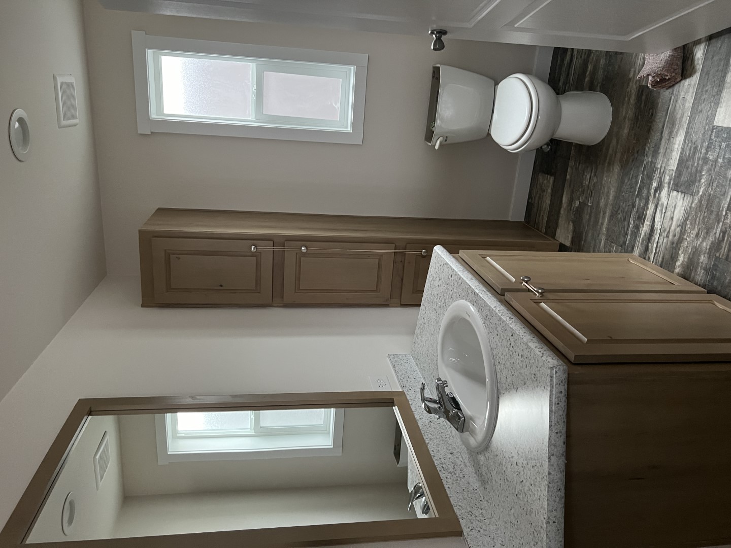 Large walk-in shower in the master bath of the Legacy singlewide home.