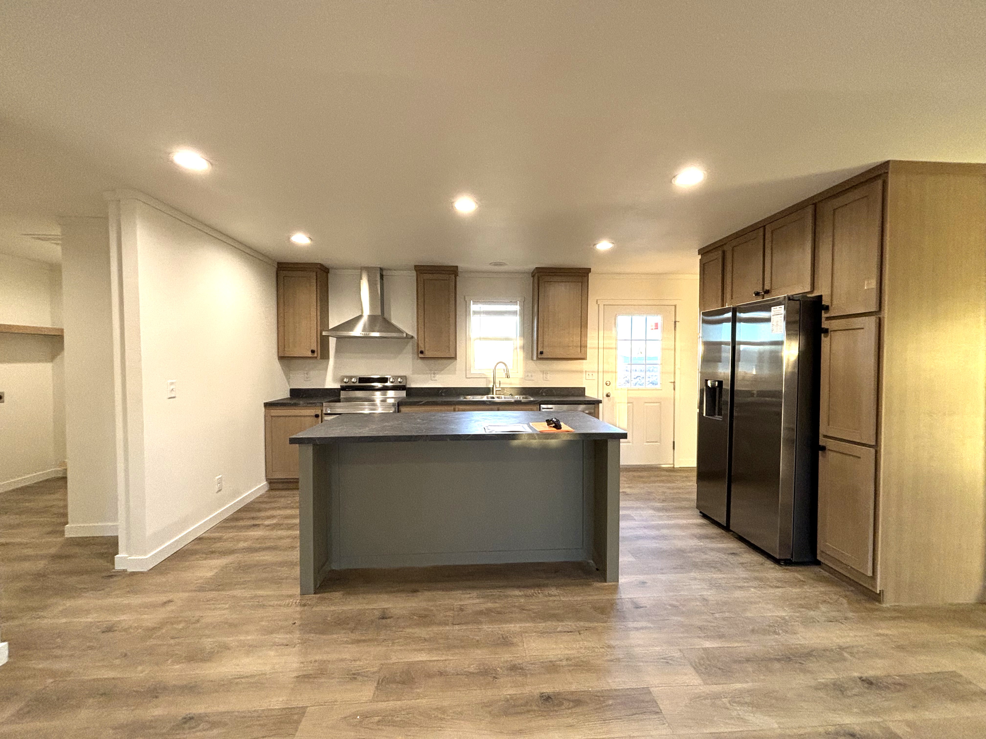 Cute kitchen with island in the Tempo Hey Jude.