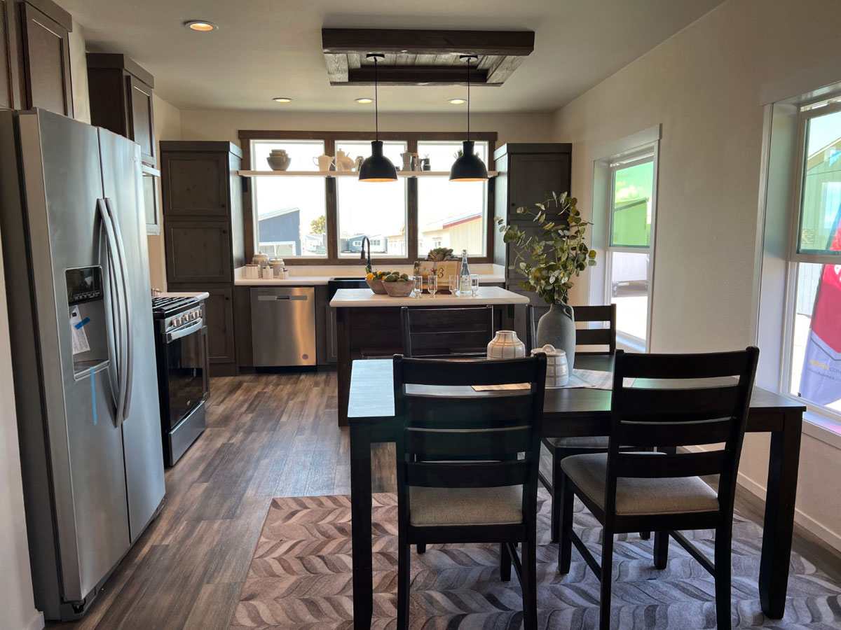 Dining space next to kitchen in The Opal home by Fleetwood.