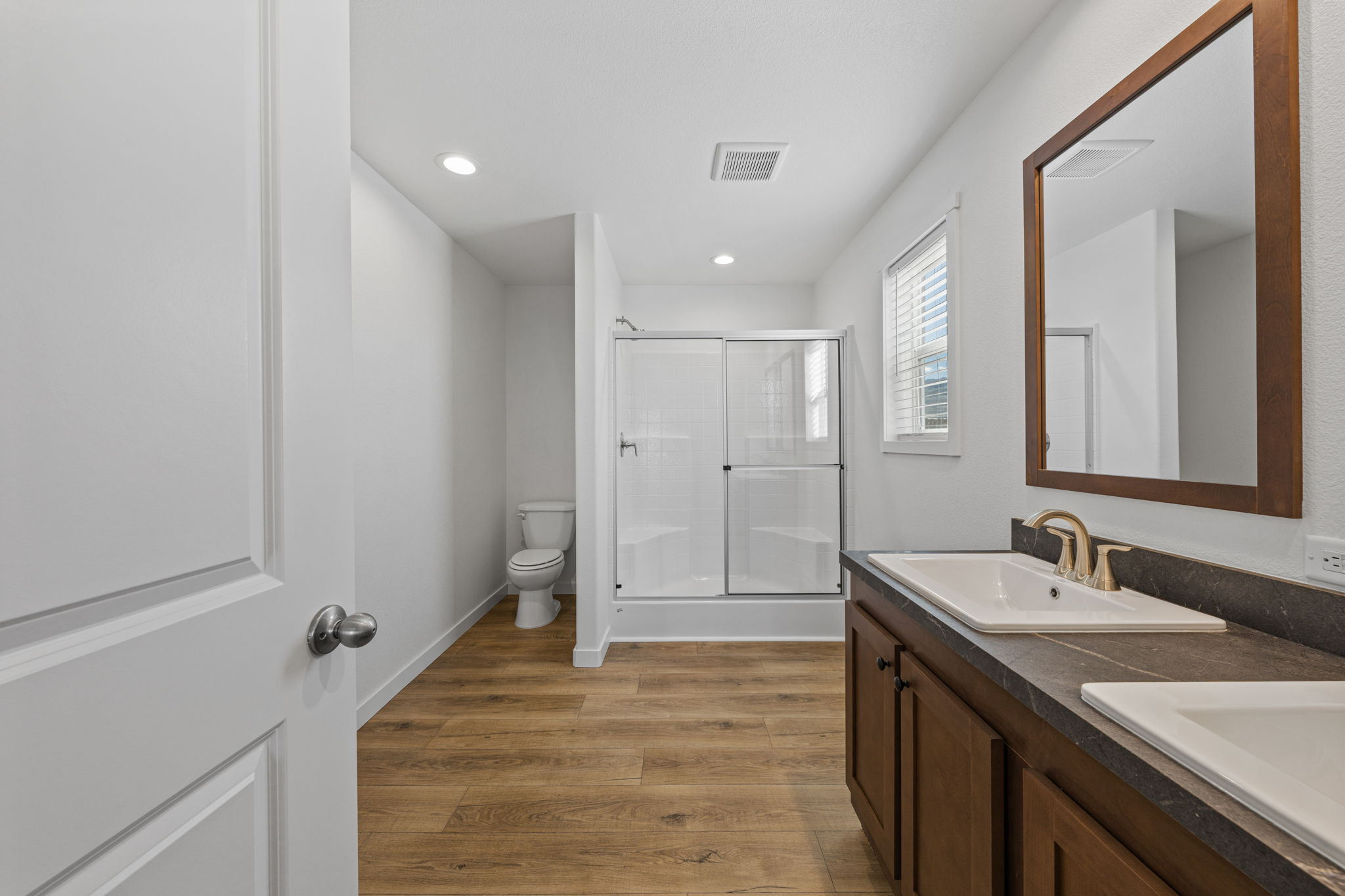 Dual sinks and modern vanity in the Tempo Staying Alive